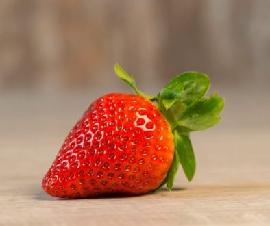 strawberry-fruit-on-brown-wooden-surface-934055/