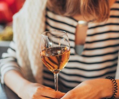 woman-holding-glass-of-wine-1927313/