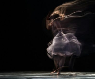 dancing-woman-on-concrete-pavement-JhqhGfX_Wd8
