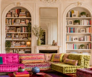 Side-by-side bookcases in a library, with one overcrowded but orderly and the other neatly arranged with more open space.