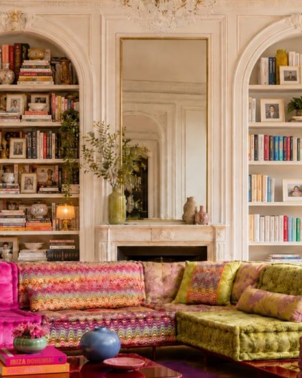Side-by-side bookcases in a library, with one overcrowded but orderly and the other neatly arranged with more open space.